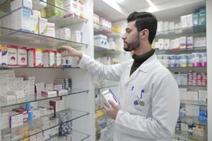 Pharmacist at Shelf
